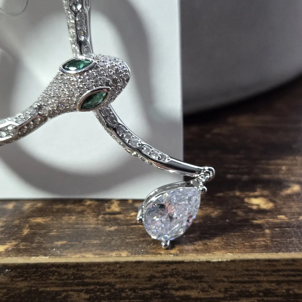 Elegant Silver‎ Snake Brooch With Green Eyes